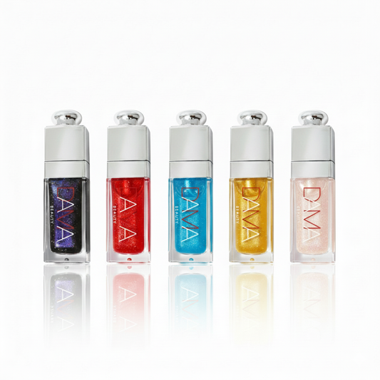 Five DAMA lip gloss bottles in different colors on a white background