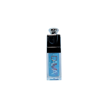 Blue lip oil with black cap on a white background